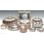 An Edwardian Mappin & Webb meat dome, 35.5cm long; another, 27cm long; entrée dishes, wine bottle