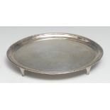 A George III silver oval teapot stand, outlined throughout with wrigglework, beaded border, fluted