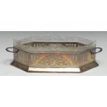 A George V silver lozenge shaped flower trough, pierced border, loop carrying handles, skirted base,