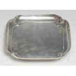 A George I silver rounded re-entrant square salver, quite plain, bracket feet, 14.5cm wide, London