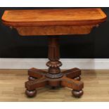 A George/William IV mahogany tea table, hinged crossbanded top above a shaped frieze applied with