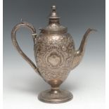 A George III Chinoiserie silver ovoid coffee pot, chased with traditional Chinese figures taking
