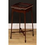 A 19th century mahogany kettle stand, wavy gallery above a slide, shaped apron, X-stretcher,