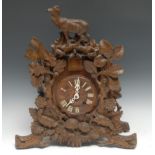 A Black Forest mantel cuckoo clock, 13.5cm dial applied with cut-card work Roman numerals, twin-