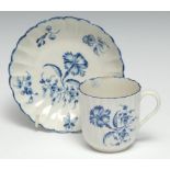 A Worcester Gilliflower pattern fluted coffee cup and saucer, crescent mark, c. 1770 -80