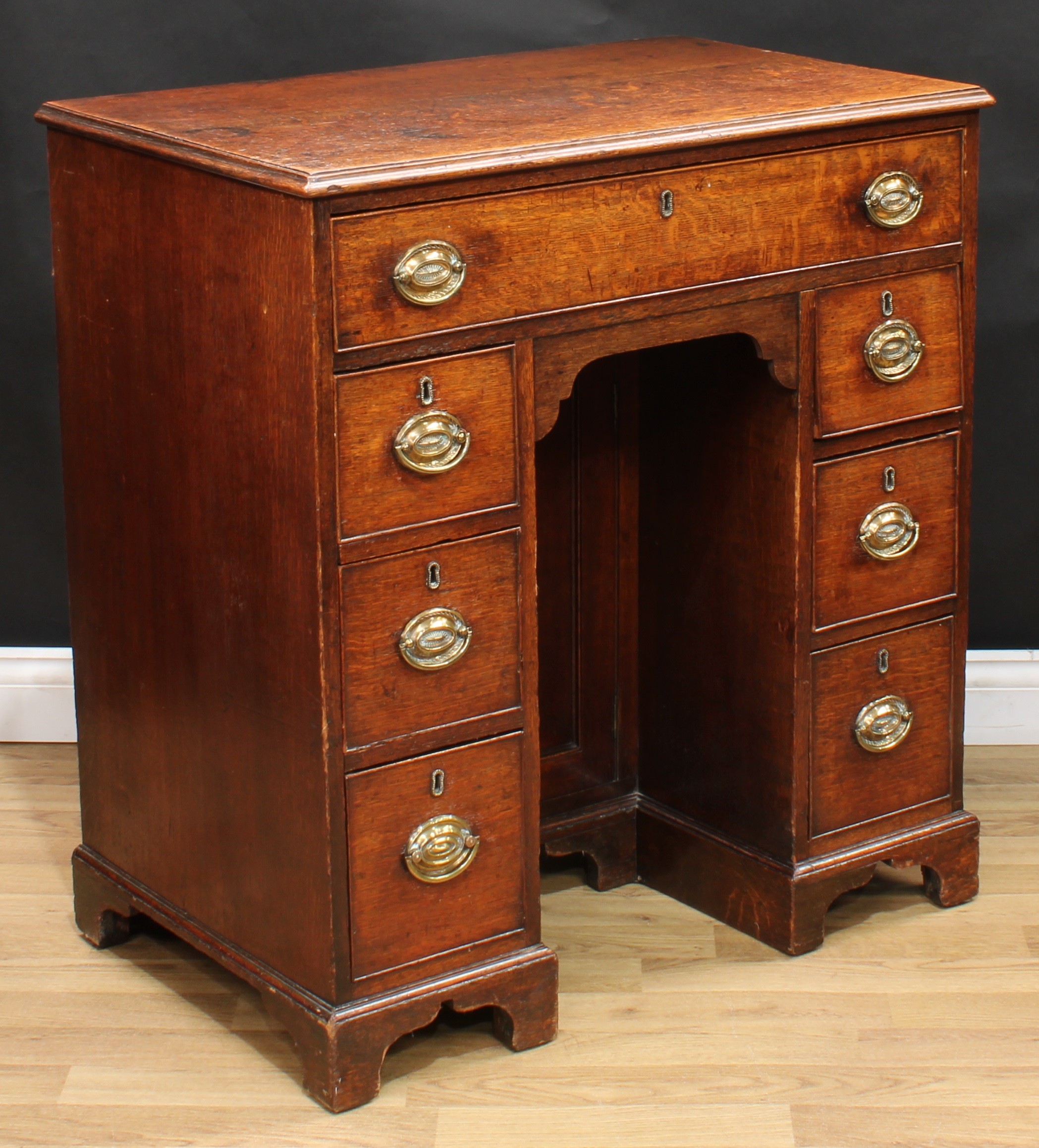 A George III oak kneehole desk, rectangular top with moulded edge above a long cockbeaded frieze - Image 3 of 6