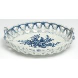 A Worcester Pine Cone pattern shaped oval basket, printed in underglaze blue with peony between