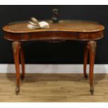 A Victorian gilt metal mounted burr walnut kidney shaped writing table, moulded top with pierced