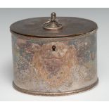 A George III Old Sheffield Plate oval tea caddy, engraved with a vacant shield shaped cartouche,