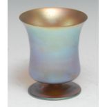 A WMF Myra iridescent glass waisted cylindrical beaker, spreading circular foot, 8.75cm high, c.1930