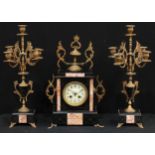 A 19th century French black and veined marble clock garniture, 9cm enamel dial inscribed with Arabic