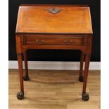 A George II Revival mahogany bureau, in the Irish taste, fall front enclosing a small door flanked