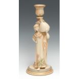 A Royal Worcester figural table lamp, made for Clarke's Cricklite Lamps, she stands wearing