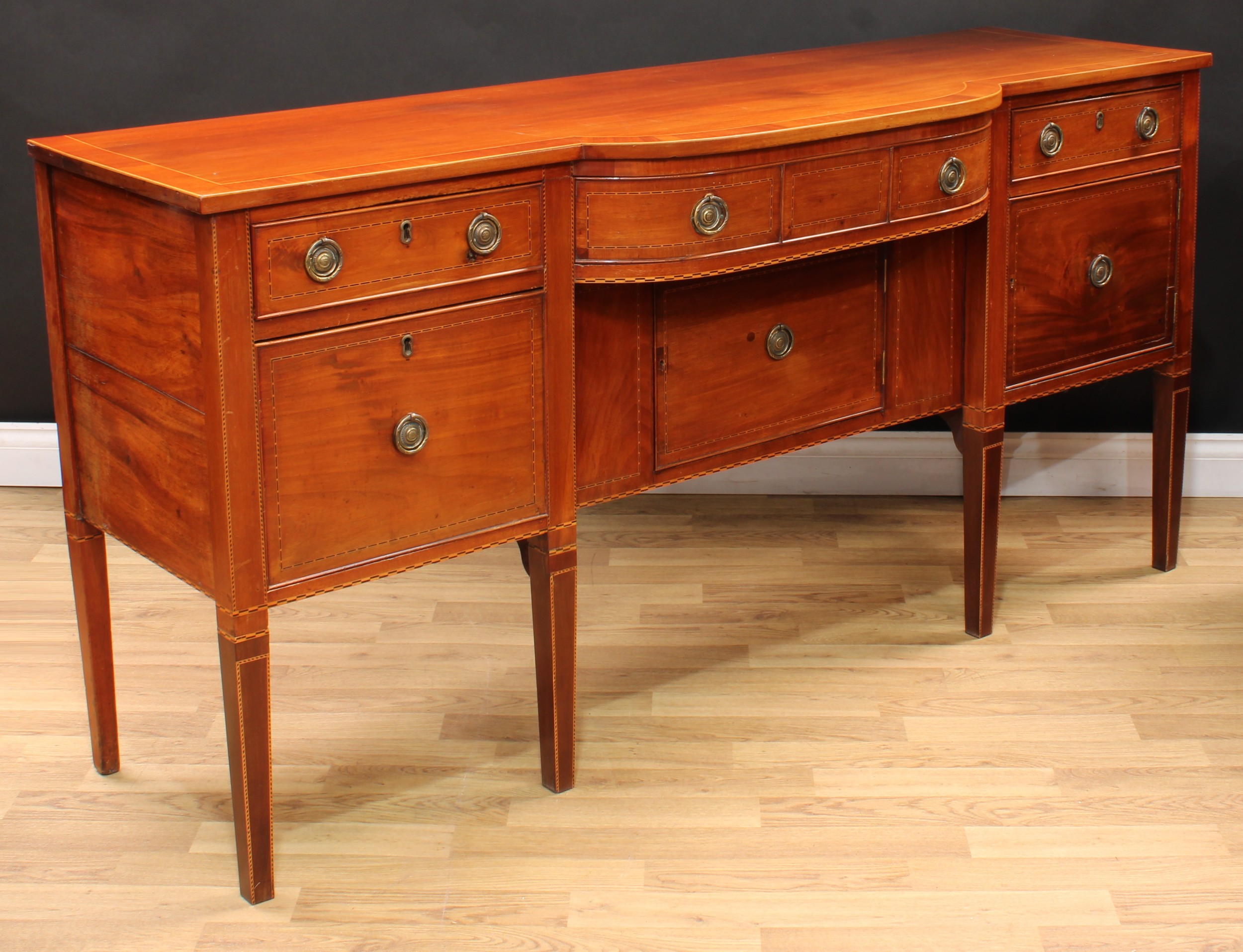 A 19th century mahogany bow-centre sideboard, crossbanded oversailing top above an arrangement of - Image 4 of 5