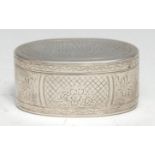 An early 19th century Continental silver oval snuff box, engraved with flowers and panels of