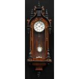 A 19th century walnut and ebonsied Vienna wall clock, by Junghans, 13cm enamel dial inscribed with