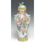 A Chinese famille verte porcelain inverted baluster vase, painted with courtly figures and sages