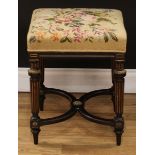 A Victorian gilt metal mounted ebonised and parcel-gilt square stool, needlework seat, tapered