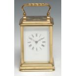 A late 19th century lacquered brass repeater carriage clock, 6cm rectangular enamel dial inscribed