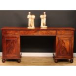 A 'Post-Regency George/William IV' mahogany and flame mahogany sideboard, slightly oversailing