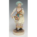 A Minton porcelain figure, of a flower seller, she stands holding flowers in her apron, typically
