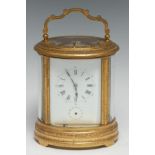 A good 19th century English repeater oval carriage clock, 7.5cm rectangular enamel dial with Roman