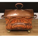 An Arts & Crafts copper bombe-shaped fuel or coal bin and cover, the long sides pressed in the Art