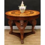An Art Deco period fiddleback mahogany and marquetry circular centre table, in the Classical