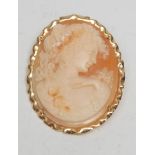 An early 20th century cameo pendant brooch, as Flora with wreath to her hair, indistinctly marked
