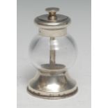 A George V silver and glass pepper grinder, 9.5cm high, William Hutton & Sons Ltd, London 1913