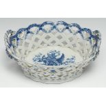 A Caughley Pine Cone oval basket, in Worcester style, printed in underglaze blue with peony