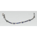 A Faberge limited edition 18ct white gold sapphire, diamond and blue enamel bracelet, inset with