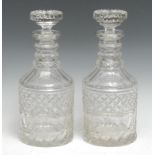 A pair of 19th century cut glass mallet-shaped decanters, mushroom stoppers, 27.5cm high