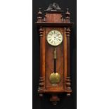 A 19th century walnut Vienna regulator wall clock, 18cm enamel dial inscribed with Roman numerals,