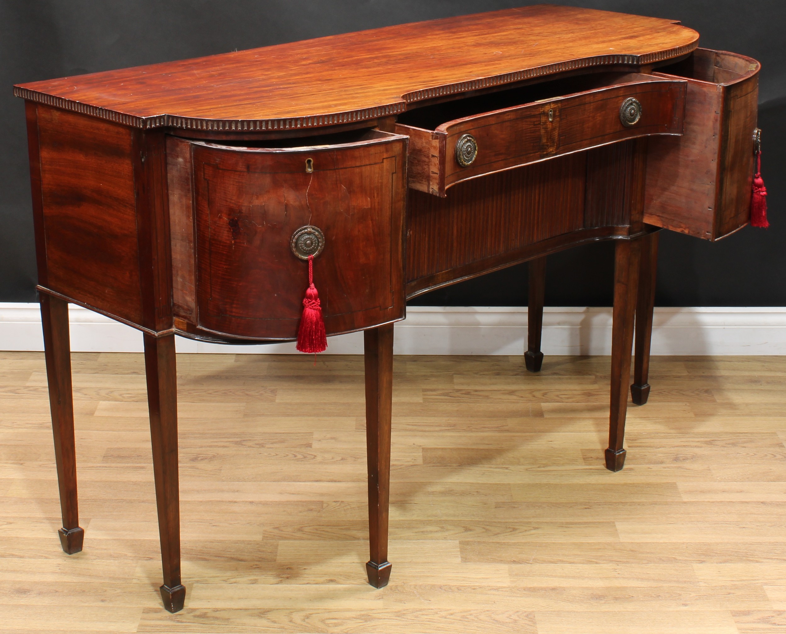 A 19th century mahogany inverted break-centre sideboard, slightly oversailing top with nulled edge - Image 5 of 7
