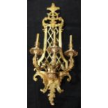 Interior Design - a substantial Louis XIV Baroque style three-light electric wall sconce, cast