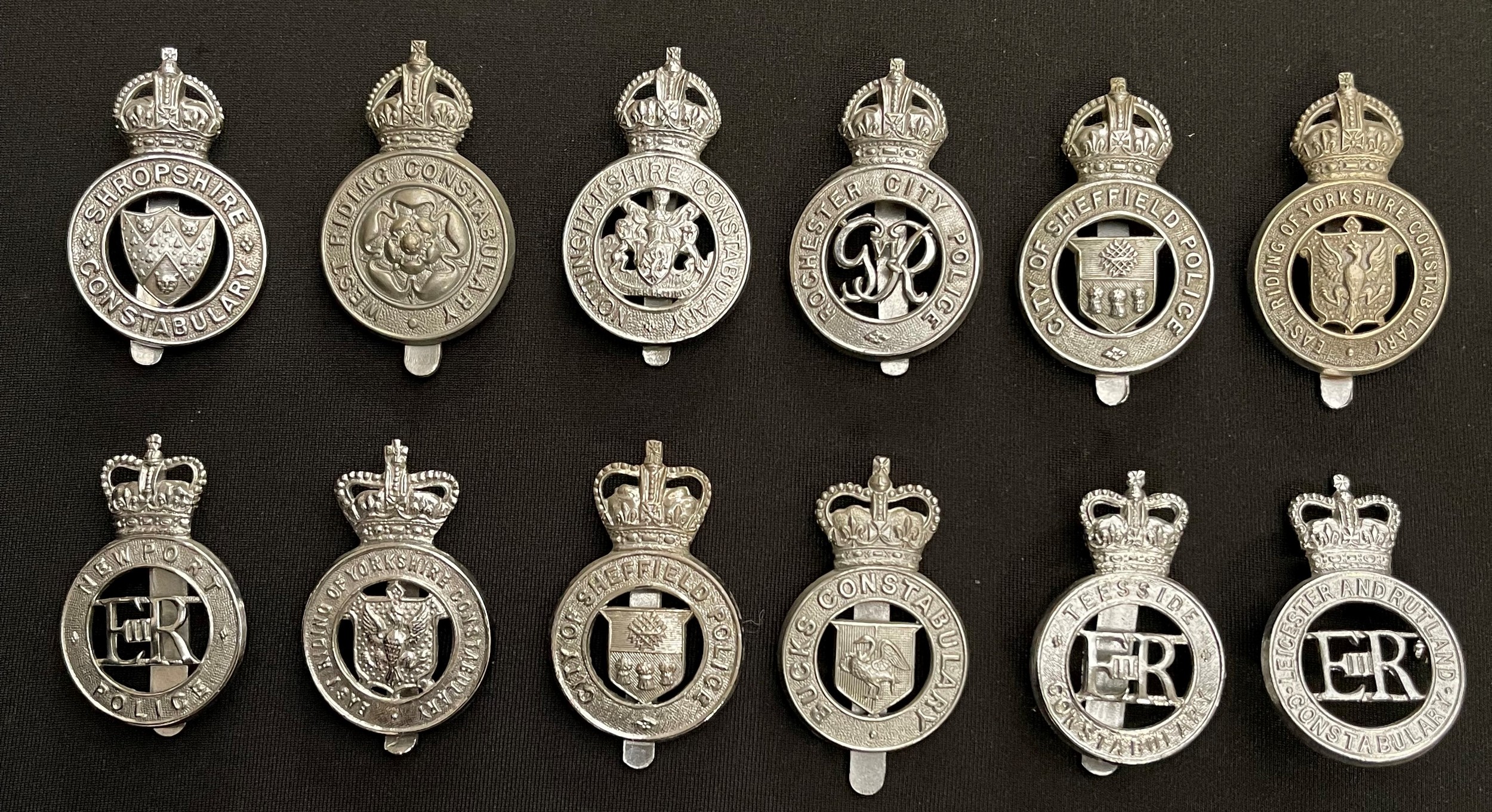 A collection of British Kings Crown and Queens Crown Police Cap badges to include: Kings Crown