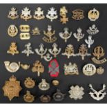 WW2 British Cap Badges, collar dogs and shoulder titles to include: Notts & Derbys x 4, collar