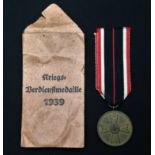 WW2 Third Reich Kriegsverdienstmedaille - War Merit Medal. Complete in original packet of issue with