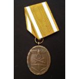 WW2 Third Reich Deutsches Schutzwall-Ehrenzeichen - West Wall Medal. Compete with ribbon. Early