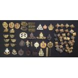 WW2 British cap badges, collar dogs, rank pips, etc plus some additional WW1: Notts & Derby Regt