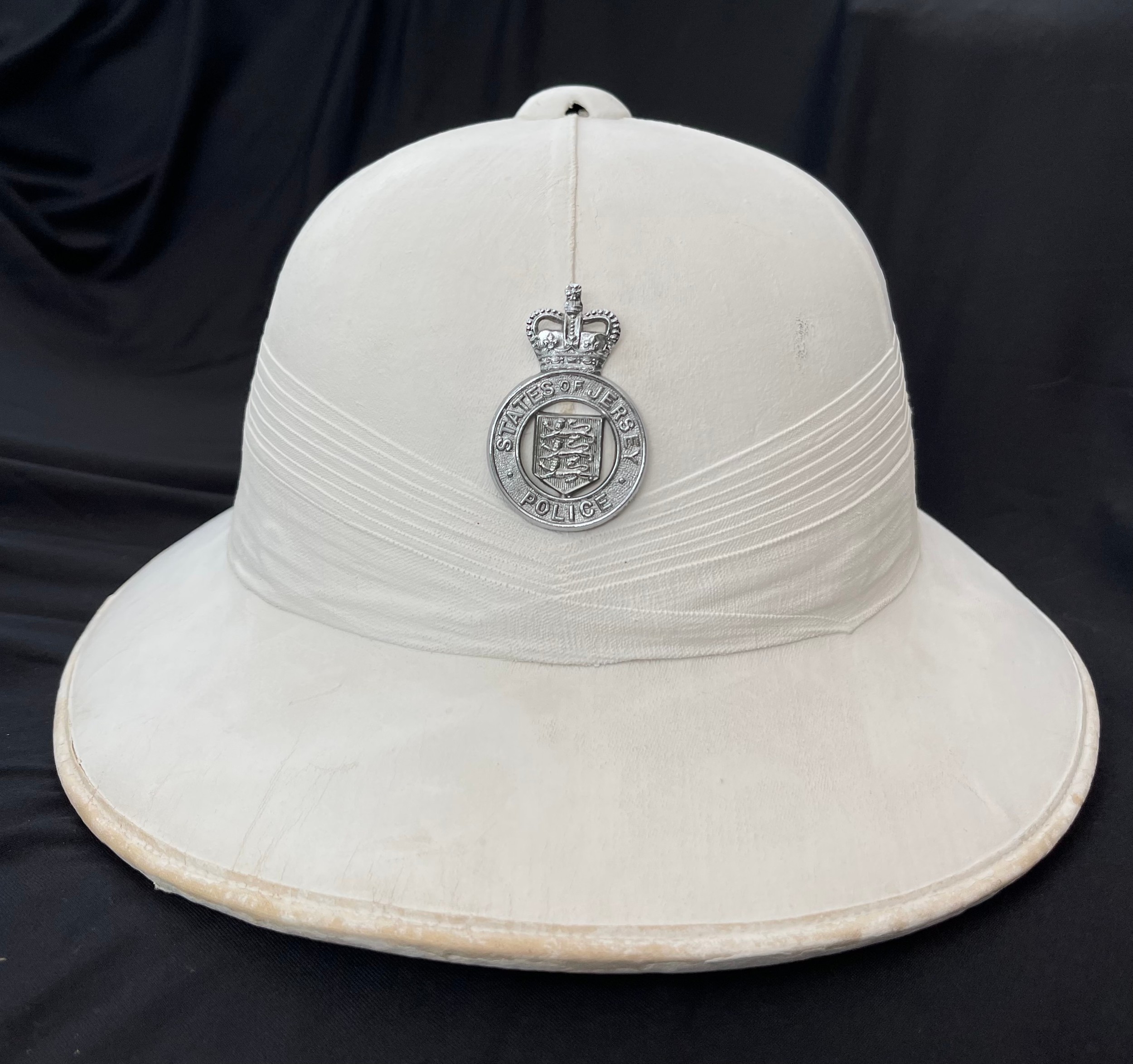 British Police Officers States of Jersey White Pith Helmet complete with Queens Crown Cap Badge.