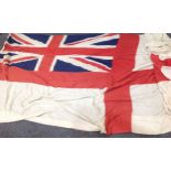 A large British Royal Navy White Ensign Flag of multi part construction, marked 10 BDTH Ensign,