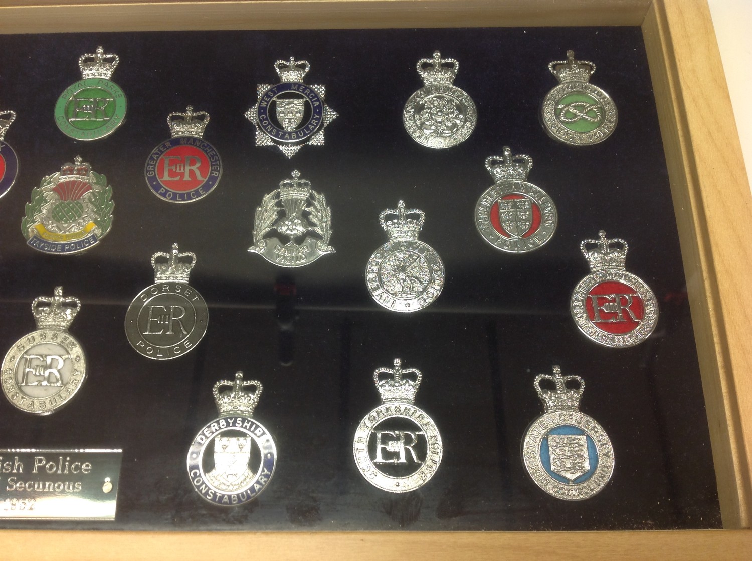 A collection of framed British Police cap badges entitled "British Police 1952" along with Motto " - Image 4 of 4