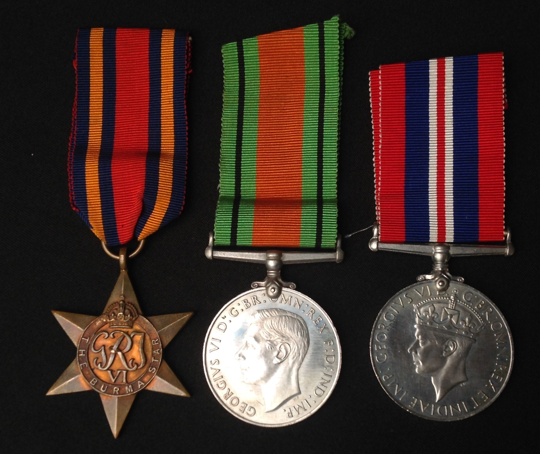 WW2 British Burma Star, Defence Medal and War Medal. All complete with original ribbons.