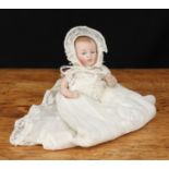 A German all bisque jointed miniature character baby doll, painted blue glass eyes and features