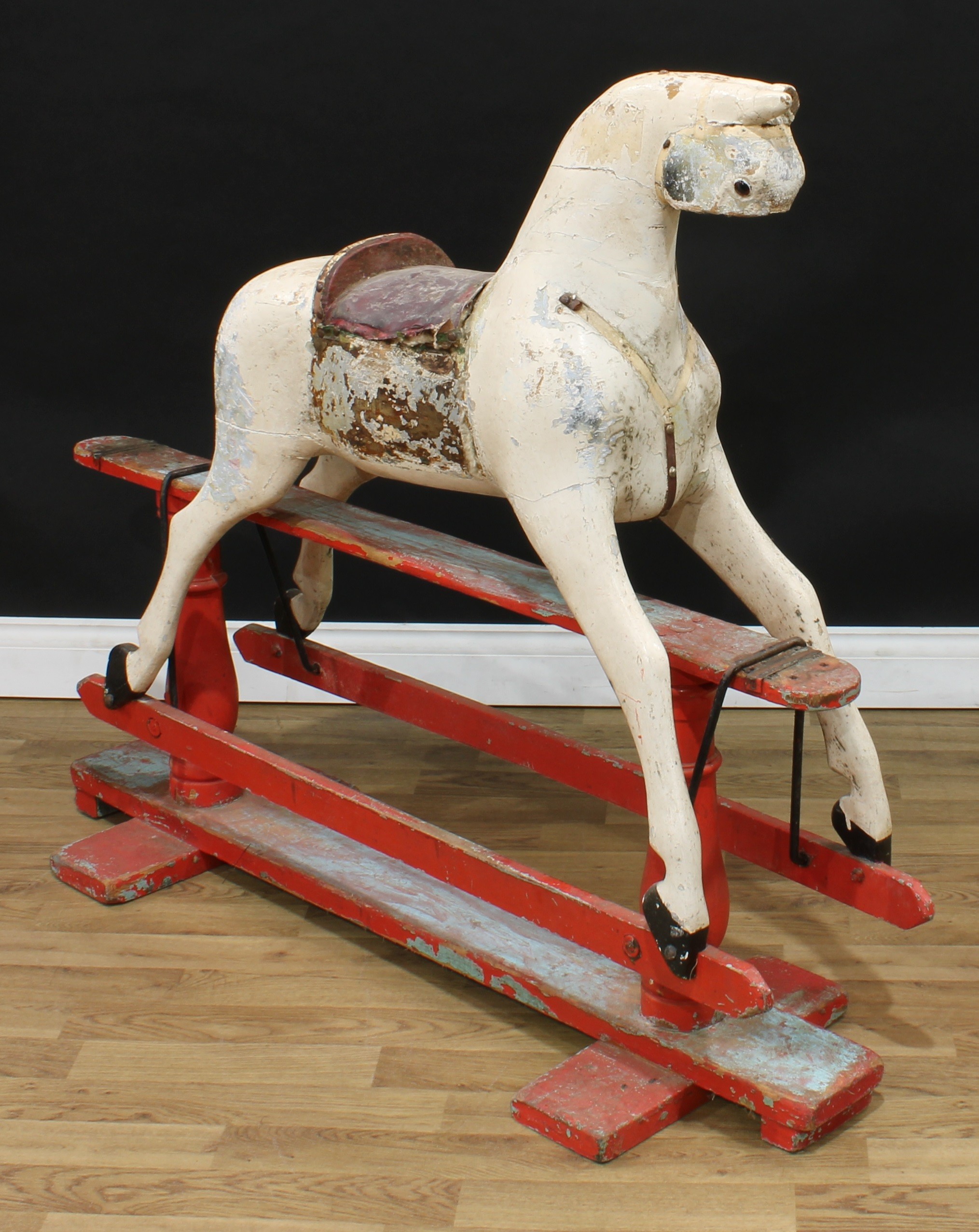 A late 19th/early 20th century English rocking horse on safety stand, the partially stripped and - Image 2 of 3