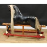 A large late 19th/early 20th century English rocking horse on safety stand, probably by F H Ayres,