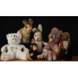 A collection of 1950's and later Steiff (Germany) soft animals, comprising black Tom Cat with arched