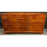 A reproduction mahogany sideboard, with ebony stringing, fitted with one long and two short